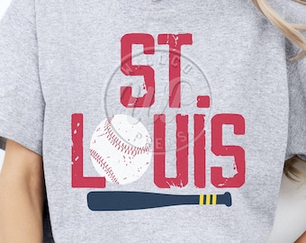 May include: Gray t-shirt with a red "St. Louis" graphic and a baseball and bat design.