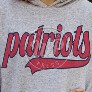 May include: Grey hooded sweatshirt with a red and blue "patriots" graphic with a red and blue "press" logo.
