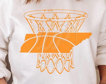 May include: Orange basketball hoop and ball graphic design on a white sweatshirt.