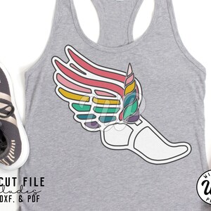 May include: A colorful winged shoe graphic design on a gray tank top. The design features a white shoe with a rainbow wing. The text "SVG CUT FILE includes PNG, DXF, & PDF" is at the bottom of the image.