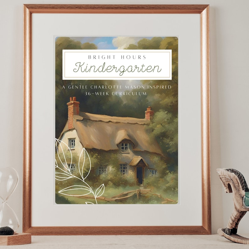 May include: A framed illustration of a cottage with a thatched roof, surrounded by greenery. The text "Bright Hours Kindergarten" and "A Gentle Charlotte Mason Inspired 36-Week Curriculum" is printed below the image.