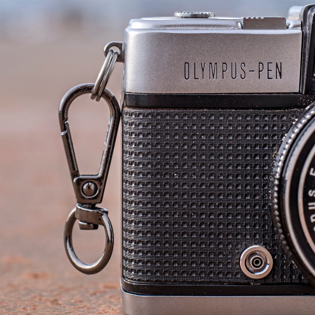 One Pair of Camera Strap Clips to Attach a Camera Strap to a Film or