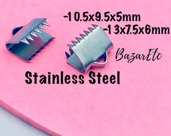 May include: Two silver-toned metal clasps with a serrated edge. The clasps are 10.5 x 9.5 x 5 mm and 13 x 7.5 x 6 mm. The text "Stainless Steel" is written below the clasps. The text "BazarEtc" is written in the upper right corner.