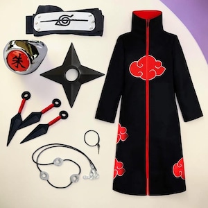 May include: A black long-sleeve cloak with a red zipper and red cloud patterns, a black headband with a metal plate featuring a spiral symbol, a silver ring with a red center, a four-pointed black star, two black kunai, and a black cord necklace.