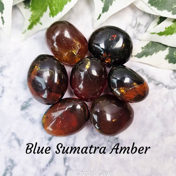 Blue Amber Freeform Cabashon From Sumantra, Indonesia Blue Amber Freeform Cabashon From Sumantra, Indonesia