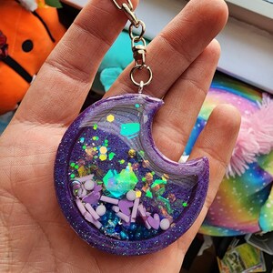 Purple moon shaker charm