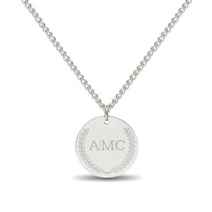 May include: A silver necklace with a round pendant featuring the letters "AIMC" surrounded by a laurel wreath.