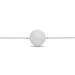 May include: A silver chain bracelet with a round charm featuring the initials "S|A" surrounded by a wreath design.