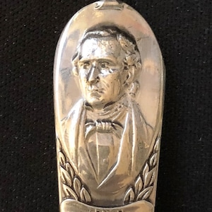 John Tyler (stem), Bust (top), Sends First Telegram (bowl) on Silver Plated Spoon - pre-owned