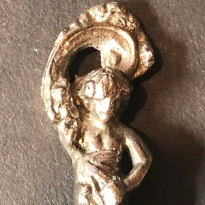 Ornate Little Boy, Italy (top) with Montagnani on Back on Silver Plate Souvenir Fork - pre-owned