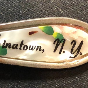 Chinatown, New York on Mother of Pearl (top) on Souvenir Spoon - pre-owned