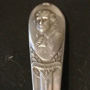 Thomas Jefferson (stem), Bust (top), Louisiana Purchase (bowl) on Silver Plated Spoon - pre-owned