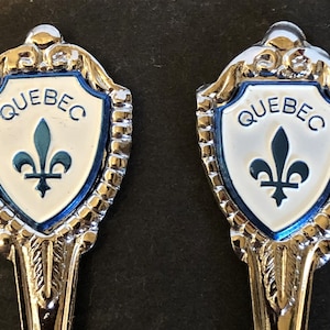Quebec with Fleur-de-Lis (top) Canada on Souvenir Fork and Spoon - pre-owned