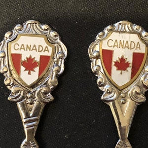 Castor, AB (bowl), Canada with Flag Crest (top) on Souvenir Folk & Spoon - pre-owned