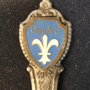 Quebec, Canada with Fleur de lis on Souvenir Spoon - pre-owned