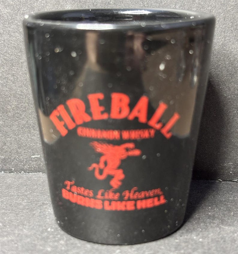 Fireball Cinnamon Whiskey * Tastes Like Heaven ~ Burns Like Hell * with "L" on 1oz Black Ceramic Shot Glass - NEW image 1