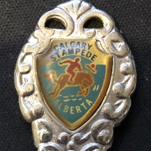 Calgary Stampede, Alberta, Canada (top) on Souvenir Spoon - pre-owned