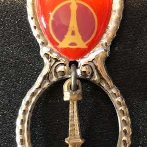 Paramount&#39;s King&#39;s Island and Eiffel Tower Charm (top) Ohio State Map with Sites (bowl) on Souvenir Spoon - pre-owned