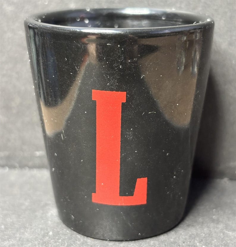 Fireball Cinnamon Whiskey * Tastes Like Heaven ~ Burns Like Hell * with "L" on 1oz Black Ceramic Shot Glass - NEW image 2