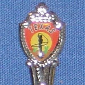 Texas and Rope Tricks (bovenaan) Kaart en locaties (platte kom) op souvenirlepel - tweedehands