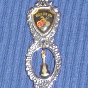 Music City USA, Nashville, Tennessee, Guitar & Banjo (top) Guitar Charm (stem) on Souvenir Spoon - pre-owned