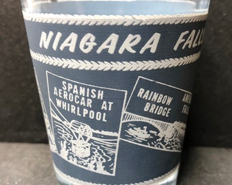 Niagara Falls, Canada with Many Sites on Grey on 1oz Glass Shot Glass with Gold Rim - NEW