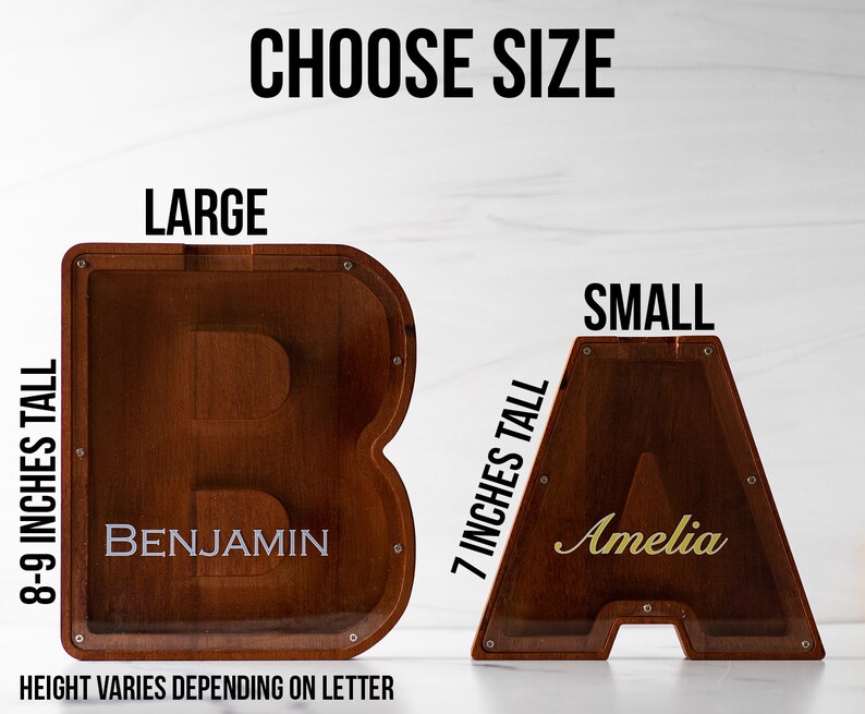 May include: Two wooden letter boxes, one large and one small. The large box is 8-9 inches tall and the small box is 7 inches tall. The large box has the name "Benjamin" written on it and the small box has the name "Amelia" written on it. The boxes are made of wood and have a clear acrylic front.