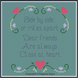 May include: Cross-stitch pattern with a green background and a quote that reads "Side by side or miles apart Dear Friends Are always Close at heart". The quote is surrounded by a floral design with red and pink hearts.