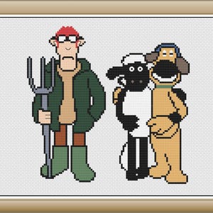 以下が含まれることがあります： クロスステッチの画像。3人の漫画のキャラクターが登場：干し草フォークを持った農夫、黒い羊、茶色の犬。農夫は緑色のジャケット、赤いメガネ、ブーツを着用しています。羊と犬は抱き合っています。