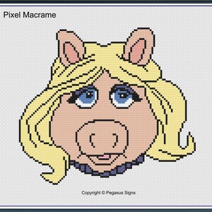 May include: Cross-stitch pattern featuring a cartoon pig with blonde hair, blue eyes, and a pink snout. The pig is wearing a purple necklace. The text "Pixel Macrame" is at the top left. Copyright Pegasus Signs is at the bottom right.