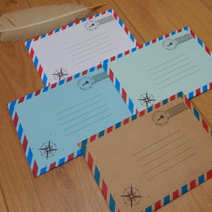 Sobres vintage C5 con autosellado y diseño de rosa de los vientos para correo aéreo