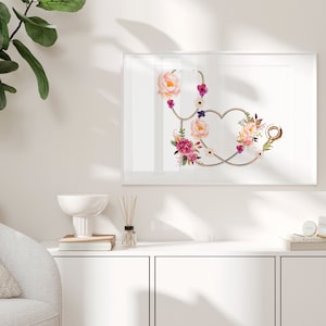 May include: A gold stethoscope with a heart shape formed by the tubing, decorated with pink, white, and purple watercolor flowers.