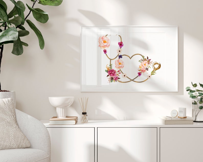 May include: A gold stethoscope with a heart shape formed by the tubing, decorated with pink, white, and purple watercolor flowers.