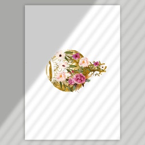 May include: A gold circle with a floral design featuring pink and white flowers and green leaves.