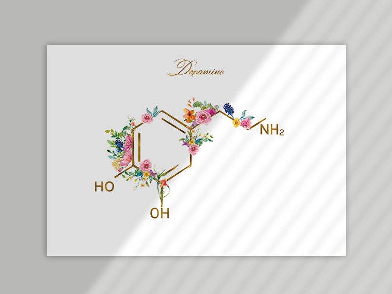 May include: A floral illustration of the chemical structure of dopamine. The molecule is outlined in gold and decorated with watercolor flowers in shades of pink, yellow, and blue. The text "Dopamine" is written in gold script at the top of the image.