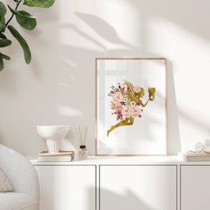 May include: A gold silhouette of a fairy with pink and purple flowers, holding a tooth, in a framed print.
