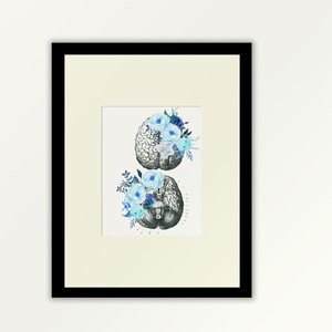 May include: A framed print of a vintage anatomical illustration of a human brain with blue and green watercolour flowers.