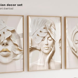 May include: A set of three framed wall art prints titled esthetician decor set instant download. Each print features a neutral-toned illustration of a face adorned with monstera leaves, with one showing a hand applying a facial treatment.
