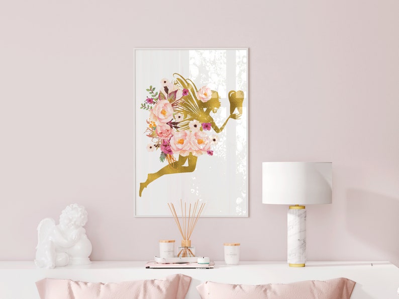 May include: A gold silhouette of a fairy with wings and flowers, holding a tooth. The fairy is surrounded by pink and white flowers. The background is white with a subtle texture.