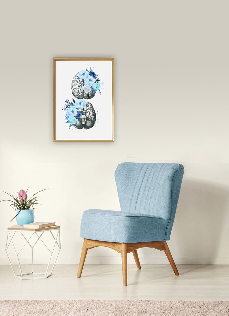 May include: A framed print of a human brain with blue flowers. The brain is a vintage anatomical illustration. The flowers are watercolour painted.