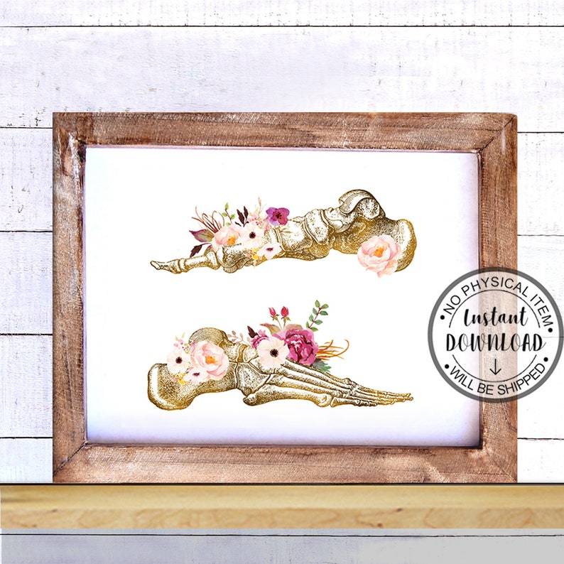 May include: Printable art print featuring a gold anatomical foot bone with pink and white floral accents. The print is framed in a rustic wood frame.