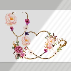 May include: A gold stethoscope with a heart shape formed by the tubing is decorated with watercolor pink, white, and purple flowers.