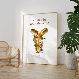 May include: A white poster with the text "Let food be your medicine" and a graphic of a golden capsule with various fruits, vegetables, and other food items spilling out.
