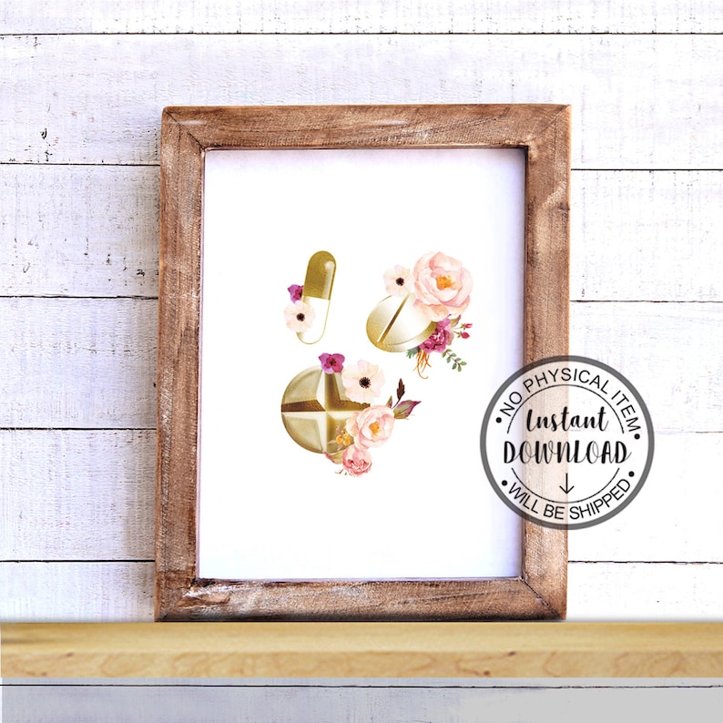 May include: Printable digital art featuring a watercolor illustration of three gold pills with pink and white flowers. The text "NO PHYSICAL ITEM INSTANT DOWNLOAD WILL BE SHIPPED" is in a circle around the pills.