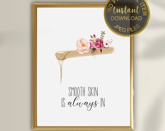 May include: Printable wall art featuring a watercolor illustration of pink and white flowers with a dripping honey stick. The text "SMOOTH SKIN IS always IN" is written in black cursive font.