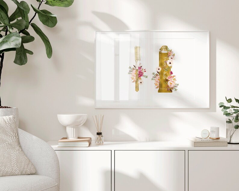 May include: A framed print with a gold toothbrush and tube of toothpaste with floral accents. The flowers are pink, white, and yellow.
