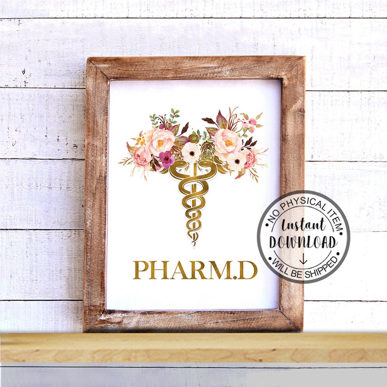 May include: A printable digital download of a gold medical caduceus symbol with pink and white floral accents. The text "PHARM.D." is below the symbol. The text "NO PHYSICAL ITEM. Instant DOWNLOAD. WILL BE SHIPPED" is in a circle around the image.