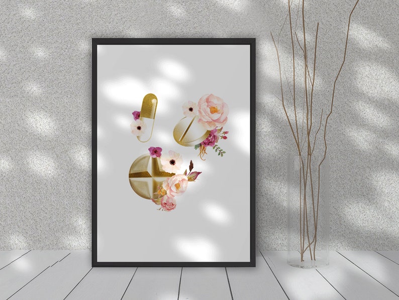 May include: A printable art print featuring a watercolor illustration of gold pills with pink and white flowers. The print is perfect for a doctor's office, pharmacy, or anyone who loves floral designs.