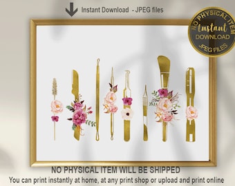 May include: Printable digital art print featuring gold-colored beauty tools with pink and white floral accents. The print includes the text "Instant Download - JPEG files" and "NO PHYSICAL ITEM WILL BE SHIPPED".