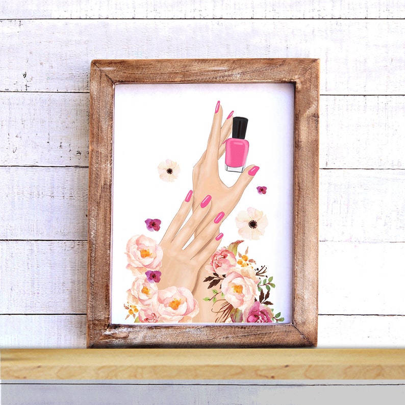 May include: A framed illustration of hands with pink nail polish holding a bottle of pink nail polish. The hands are surrounded by pink and white flowers.